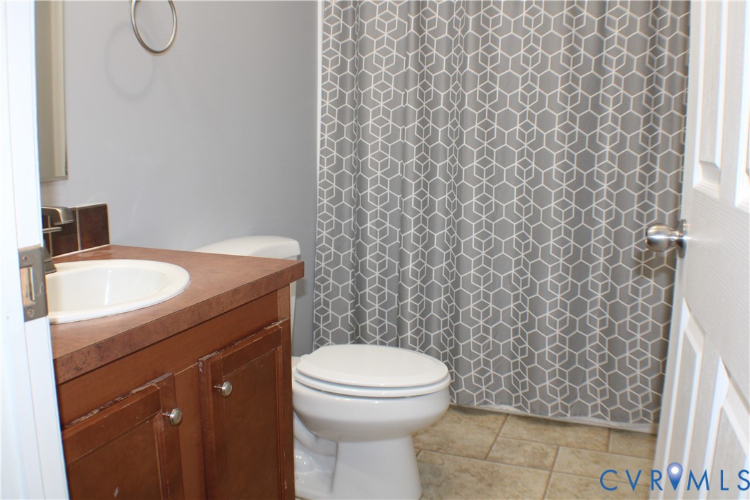 1811 Halls Store Road Mineral, VA 23117 - Photo 19 of 39 Full bathroom featuring vanity, a shower with show