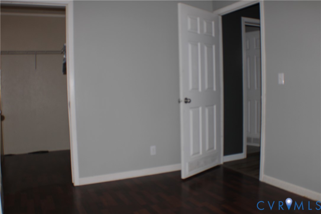 1811 Halls Store Road Mineral, VA 23117 - Photo 23 of 39 Unfurnished bedroom featuring a spacious closet an
