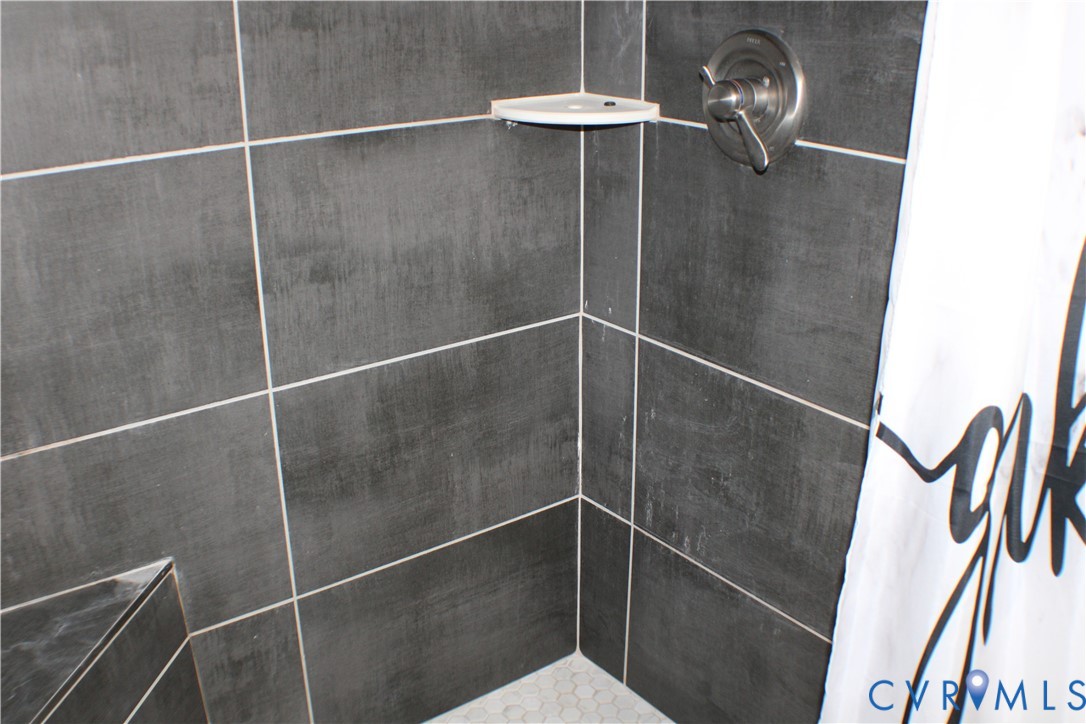 1811 Halls Store Road Mineral, VA 23117 - Photo 29 of 39 Bathroom view of a tile shower