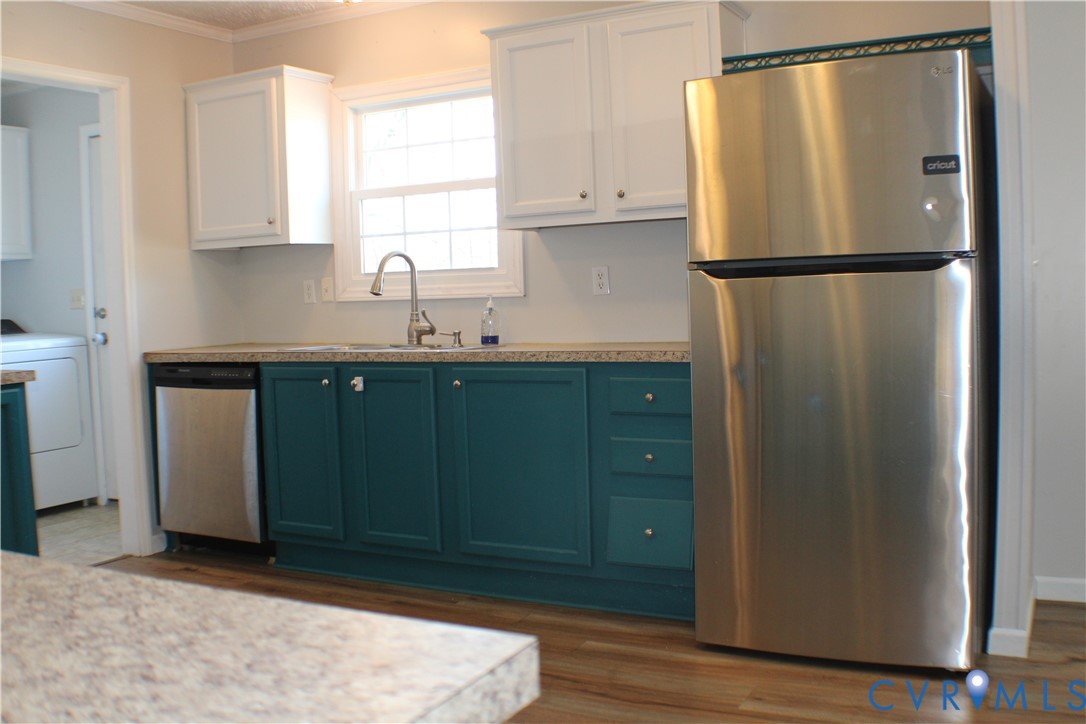 1811 Halls Store Road Mineral, VA 23117 - Photo 35 of 39 Kitchen with stainless steel appliances, white cab