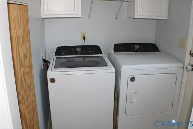a room with cabinets and a window
