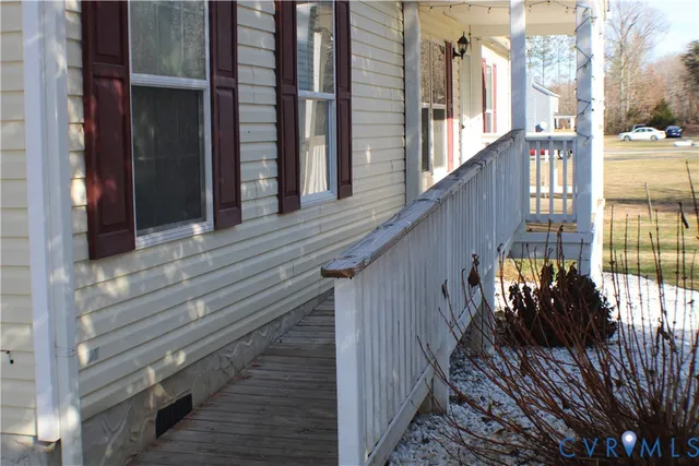 a view of balcony and wooden floor