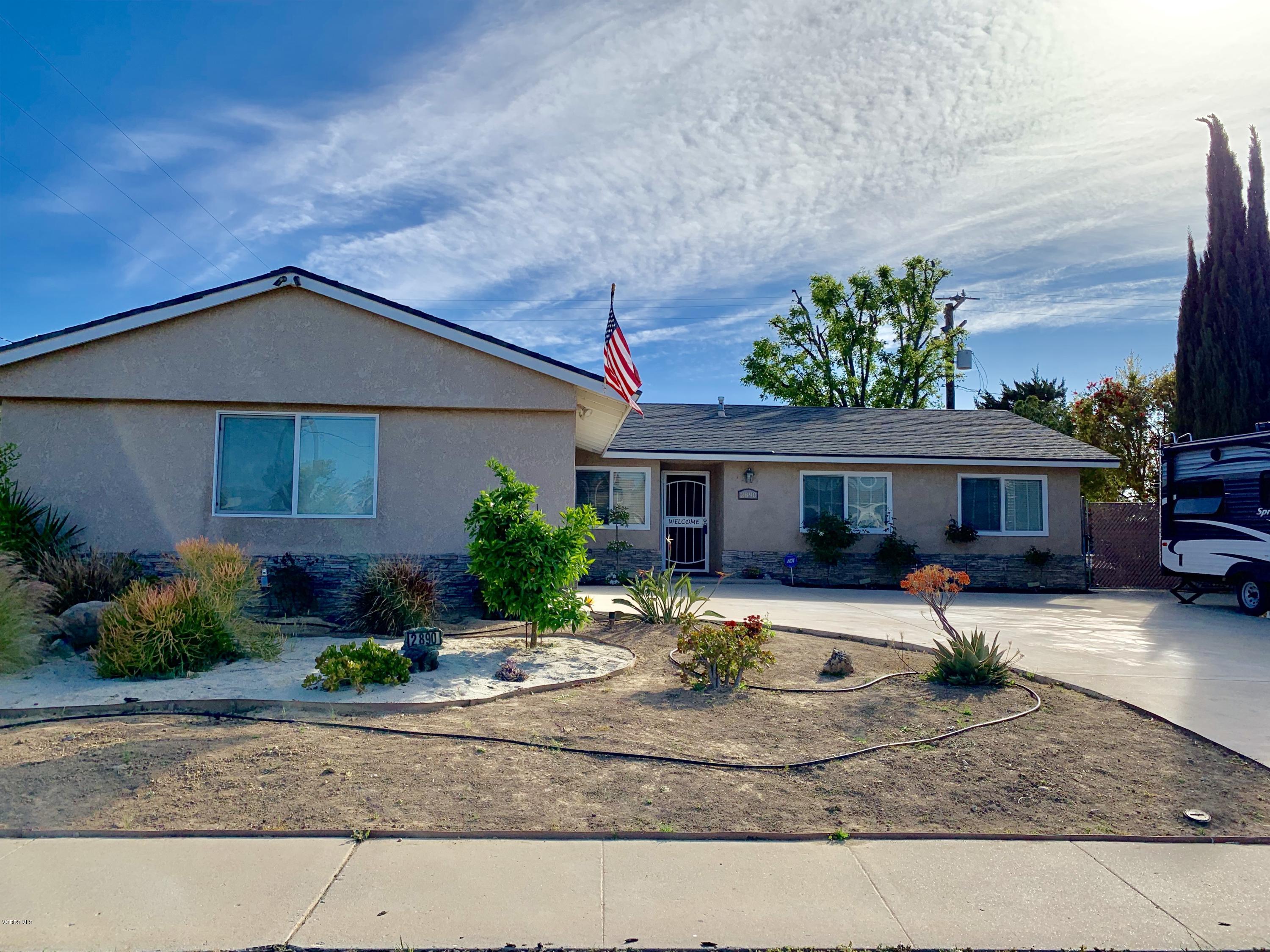 2890 Fitzgerald Road Simi Valley, CA 93065 - Photo 1 of 40 a front view of a house with garden