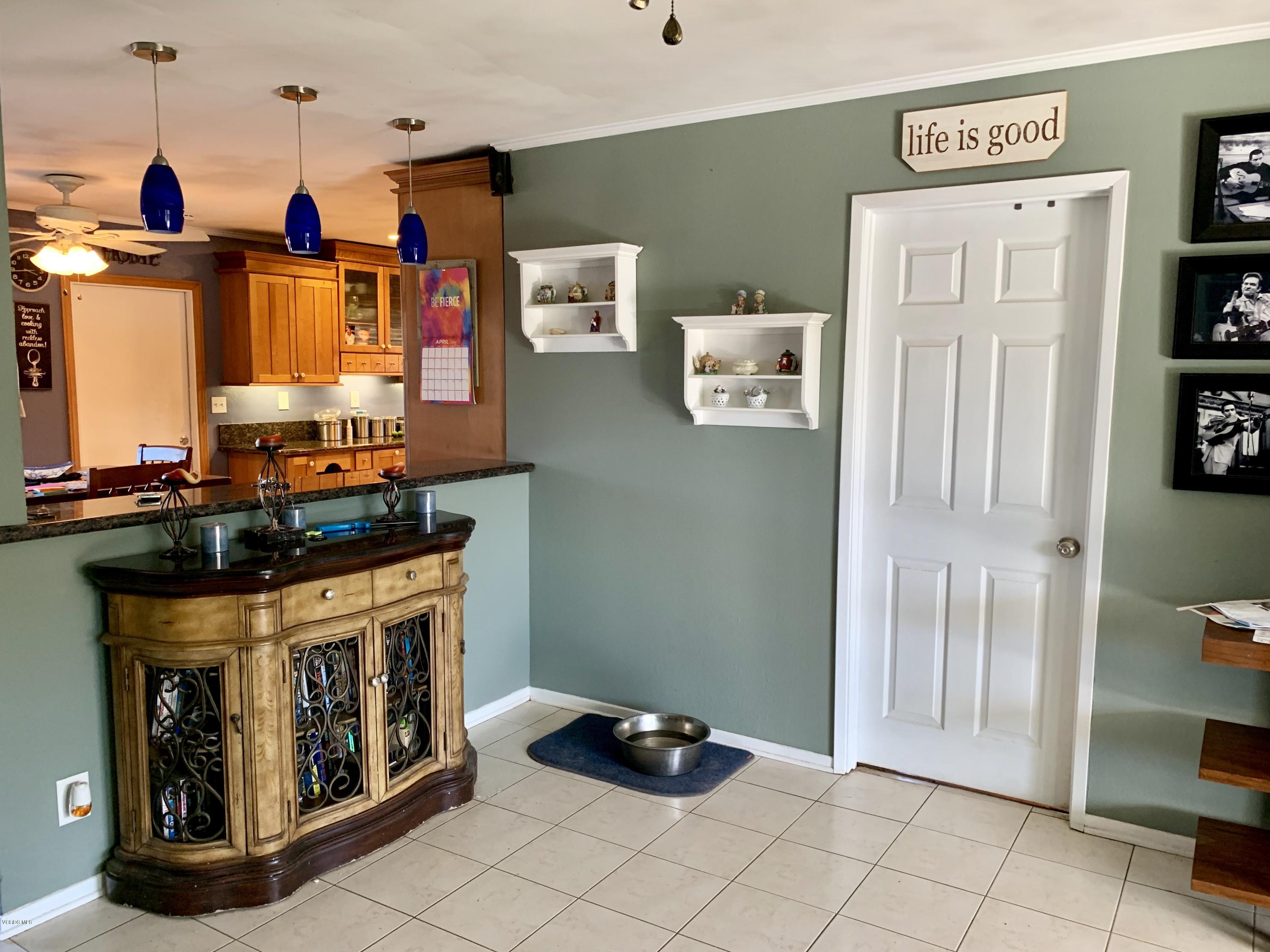 2890 Fitzgerald Road Simi Valley, CA 93065 - Photo 17 of 40 a kitchen with stainless steel appliances granite countertop a refrigerator and a stove