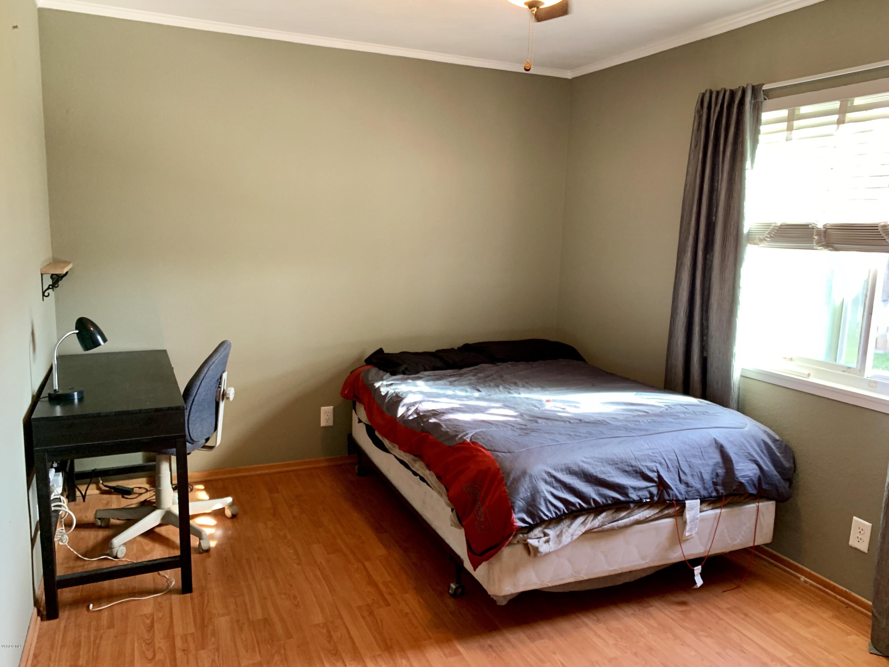 2890 Fitzgerald Road Simi Valley, CA 93065 - Photo 19 of 40 a bedroom with a bed and a window