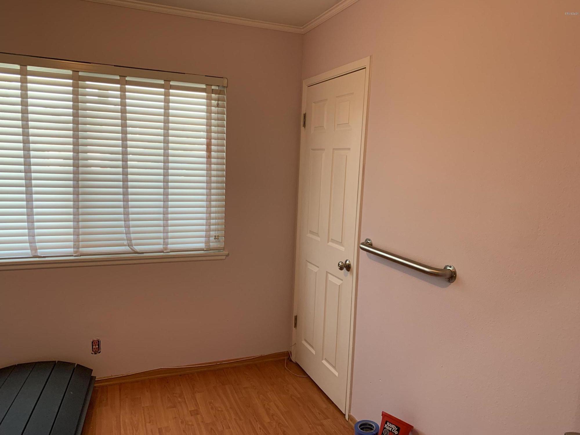 2890 Fitzgerald Road Simi Valley, CA 93065 - Photo 22 of 40 an empty room with wooden floor and a window