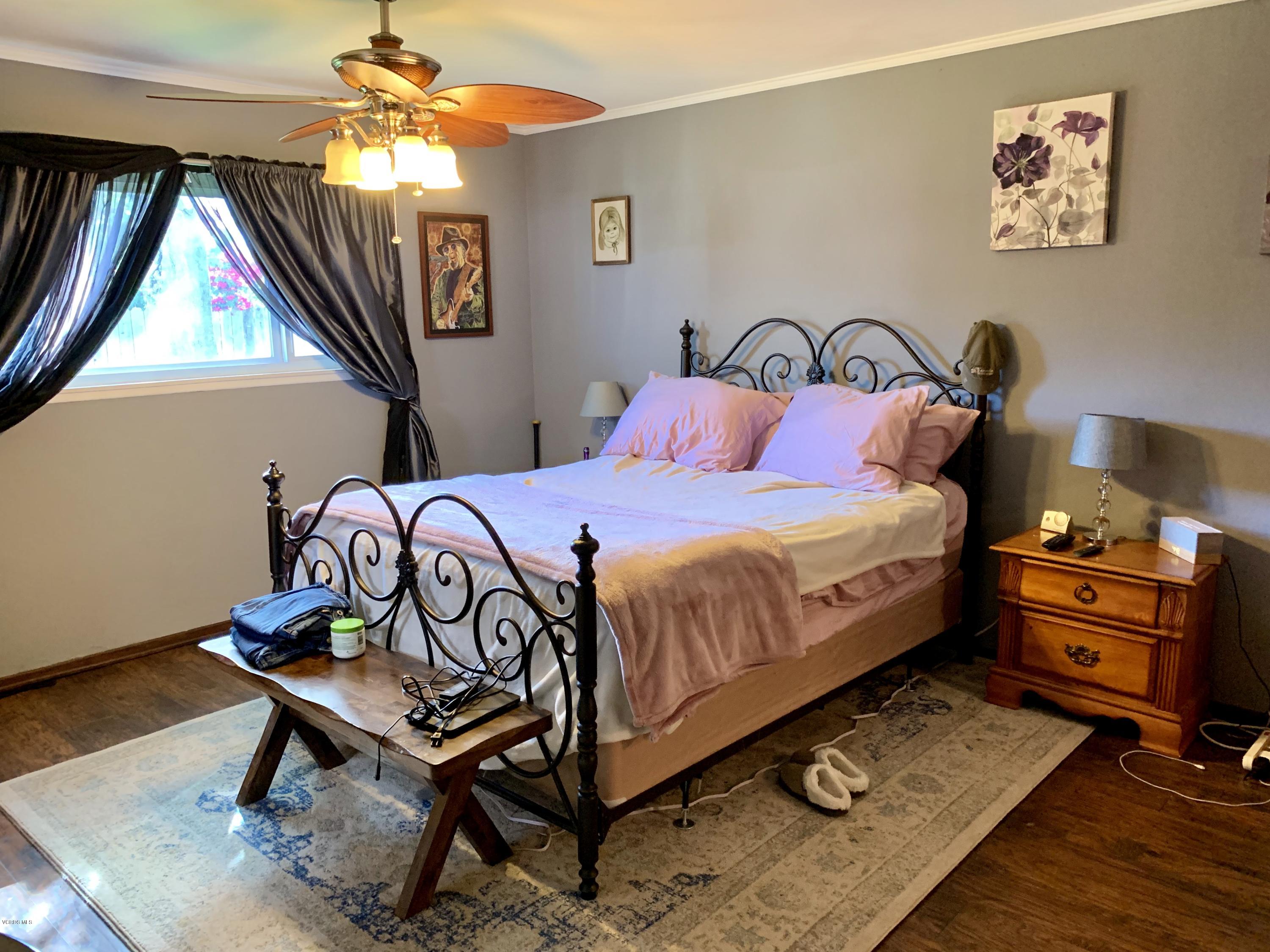 2890 Fitzgerald Road Simi Valley, CA 93065 - Photo 28 of 40 a bedroom with a bed and a dresser