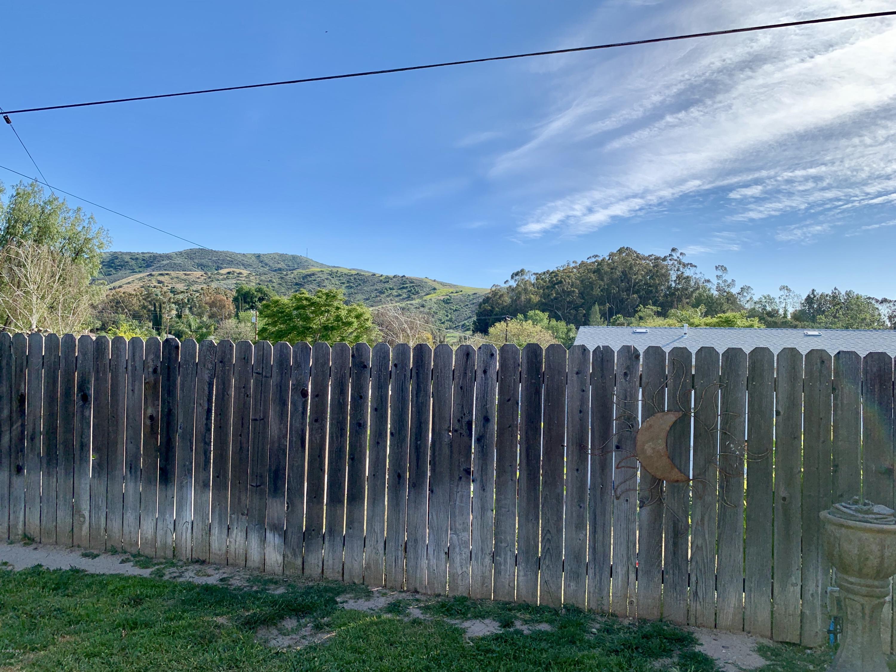 2890 Fitzgerald Road Simi Valley, CA 93065 - Photo 32 of 40 a view of a backyard with wooden fence