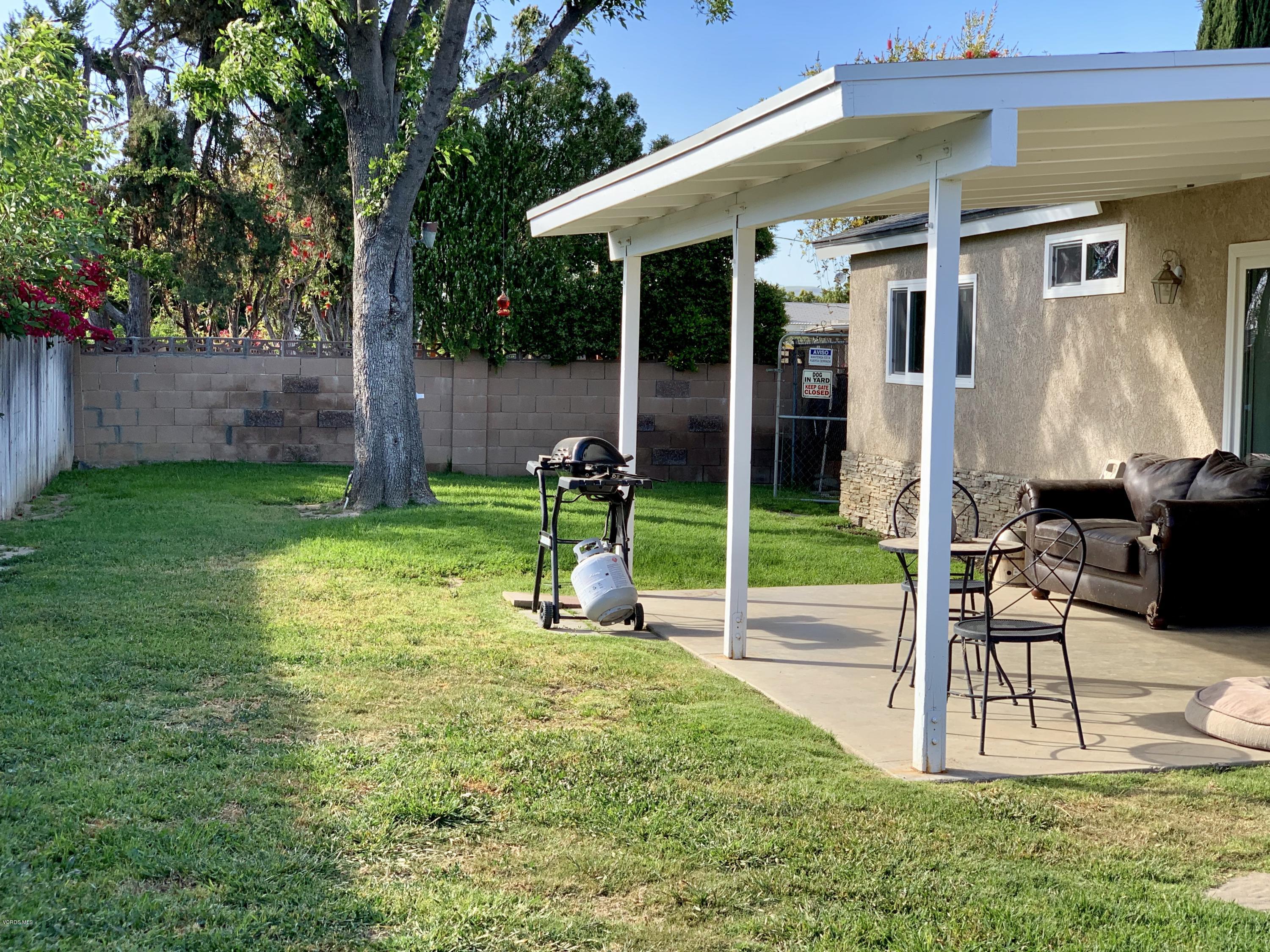 2890 Fitzgerald Road Simi Valley, CA 93065 - Photo 34 of 40 a view of a chair and table in the garden
