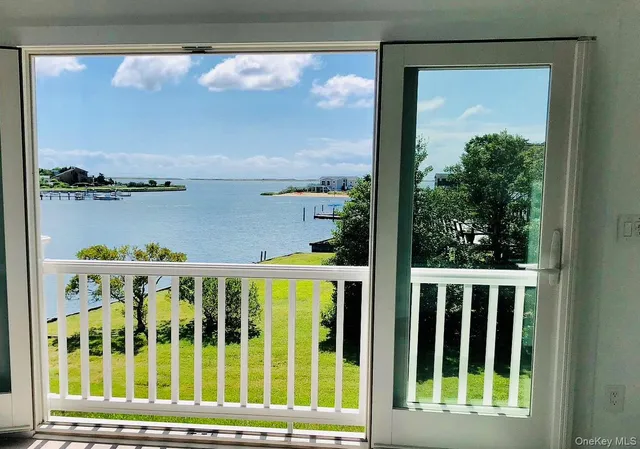 a view of a small yard from a balcony