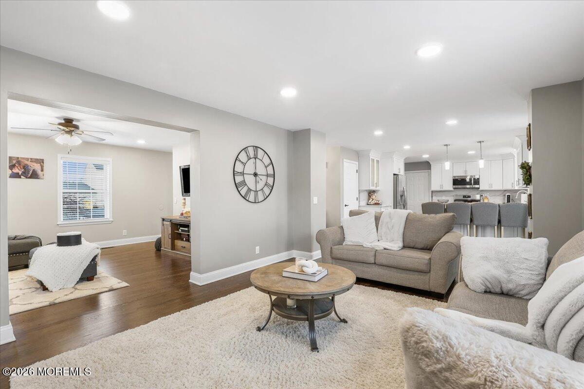 25 Community Place Long Branch, NJ 07740 - Photo 11 of 35 a living room with furniture kitchen view and a table