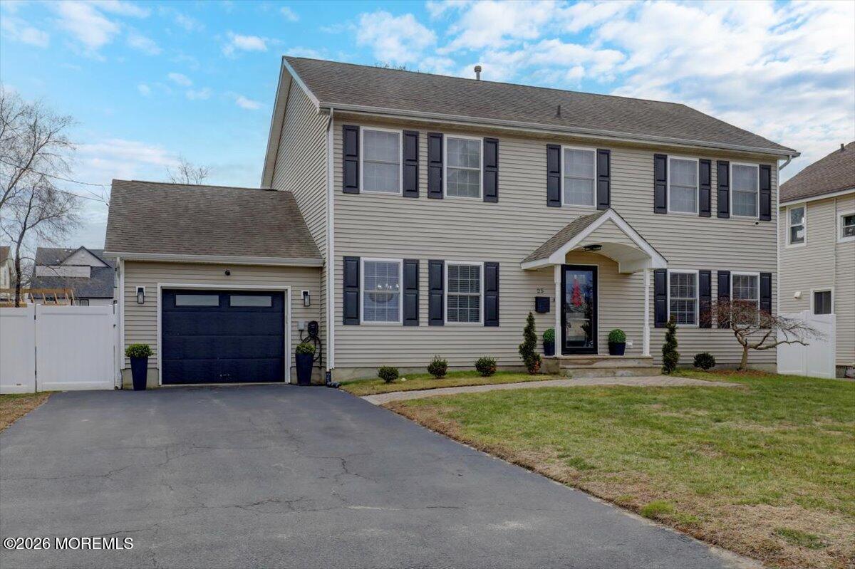 25 Community Place Long Branch, NJ 07740 - Photo 2 of 35 a front view of a house with a yard