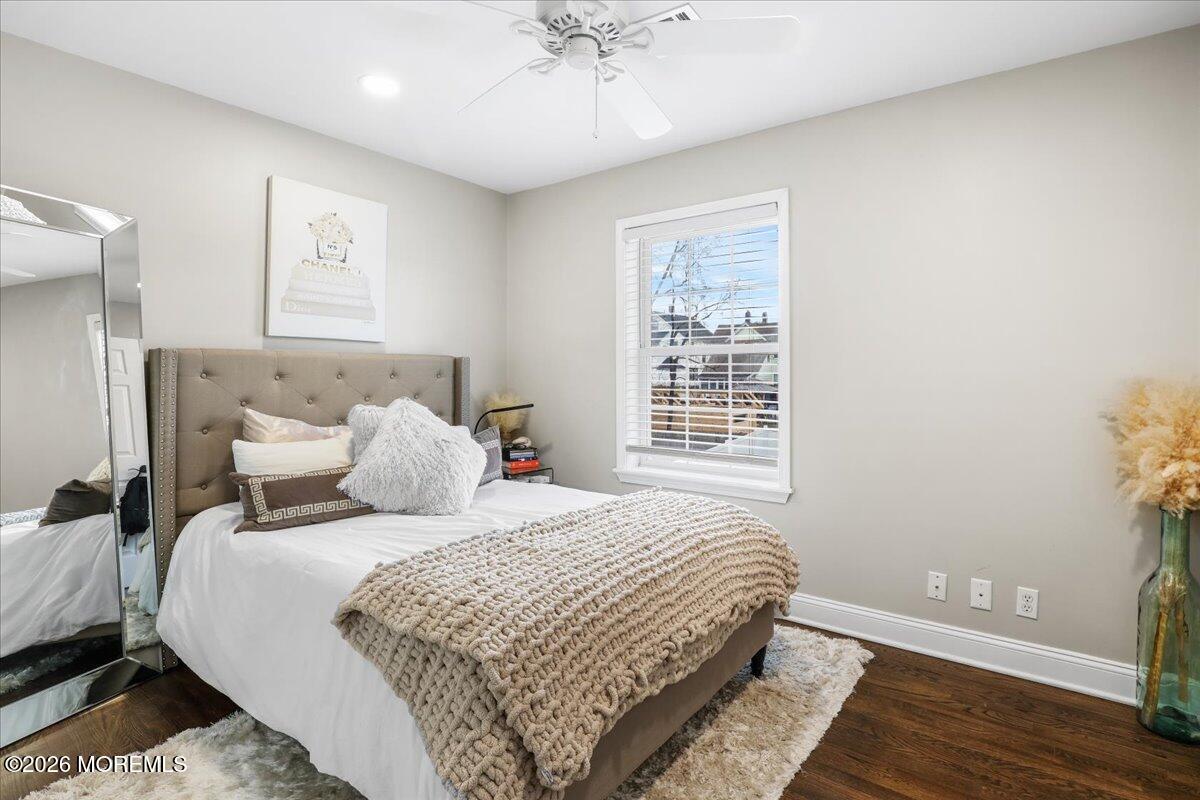 25 Community Place Long Branch, NJ 07740 - Photo 23 of 35 a bedroom with a large bed and a window