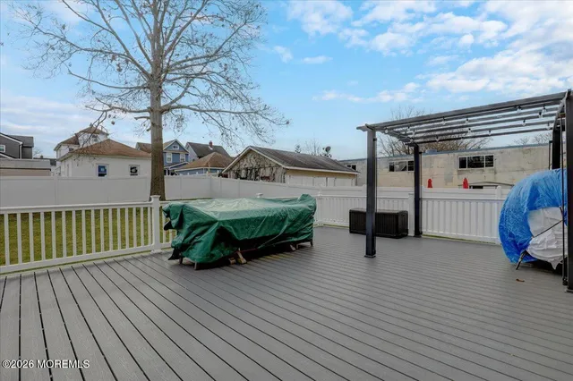 a view of a two chairs in the roof deck