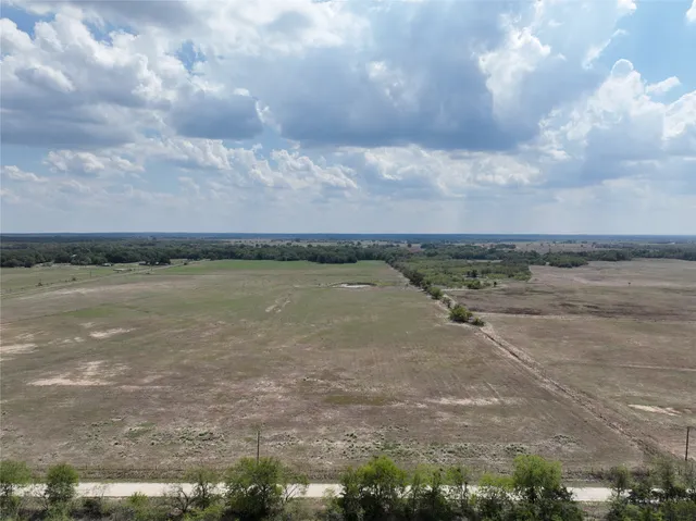 a view of a swimming pool with an ocean view