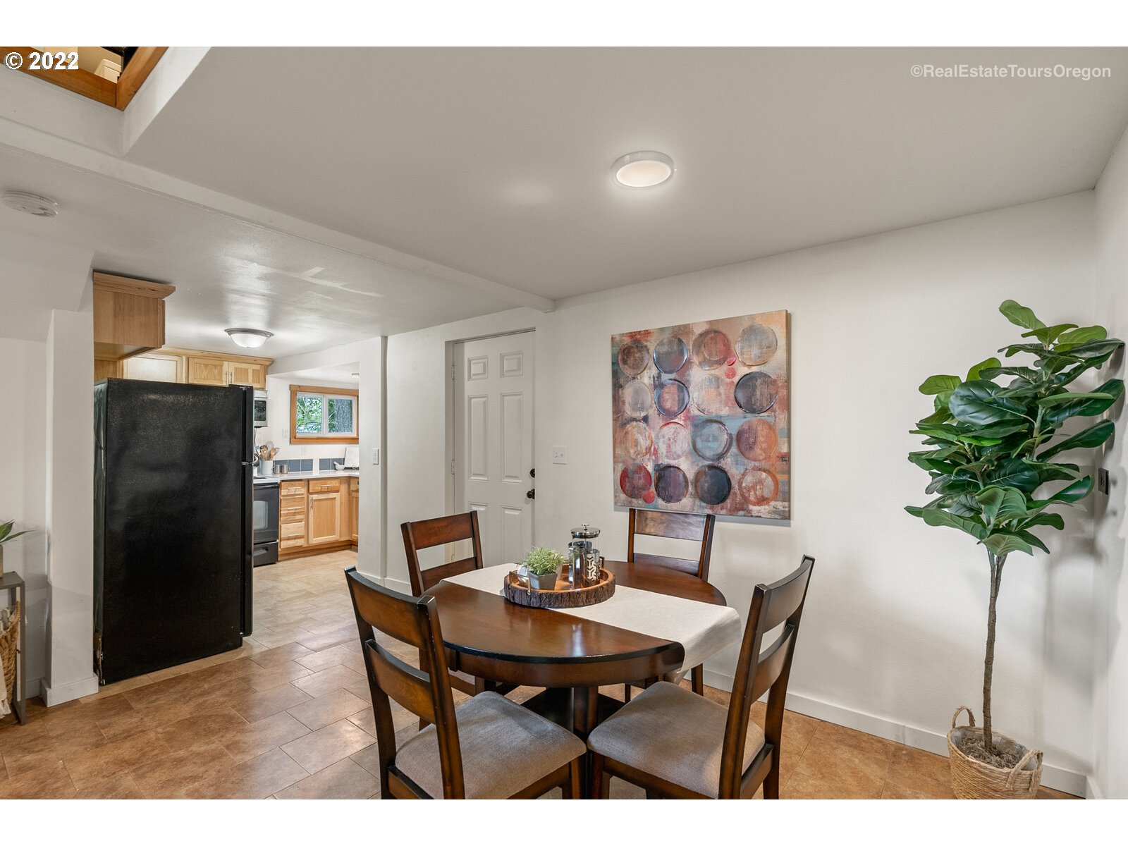 40155 Southwest Dixon Mill Road Gaston, OR 97119 - Photo 3 of 31 a view of a dining room with furniture and chandelier