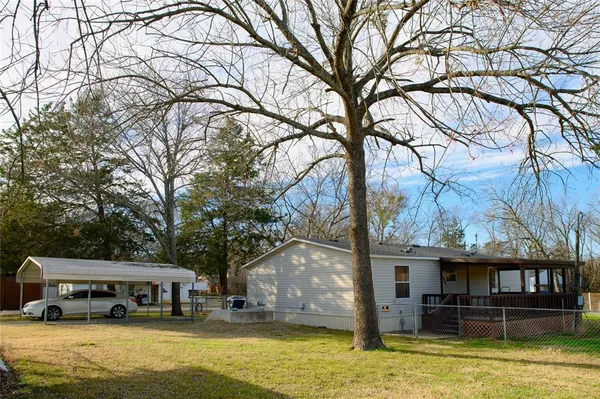 a front view of a house with swimming pool