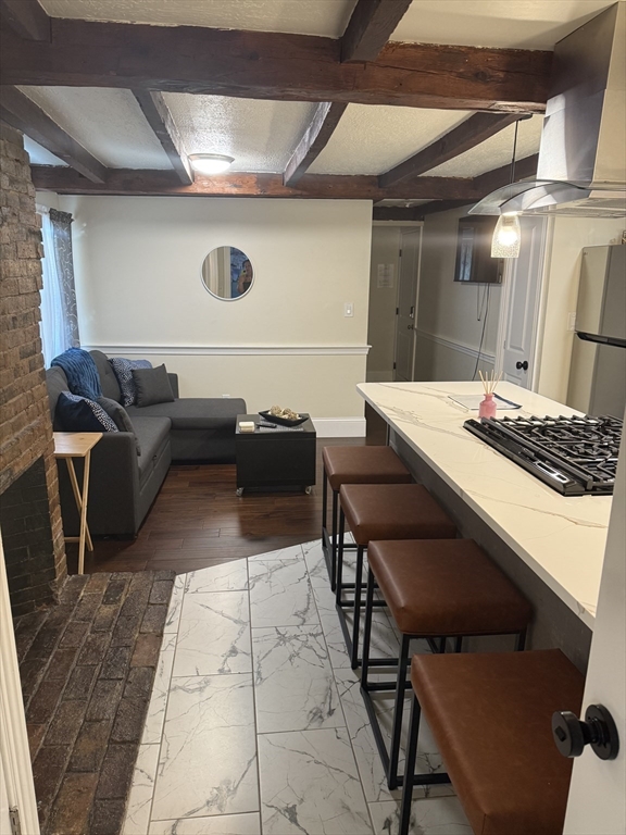 a living room with furniture and a table