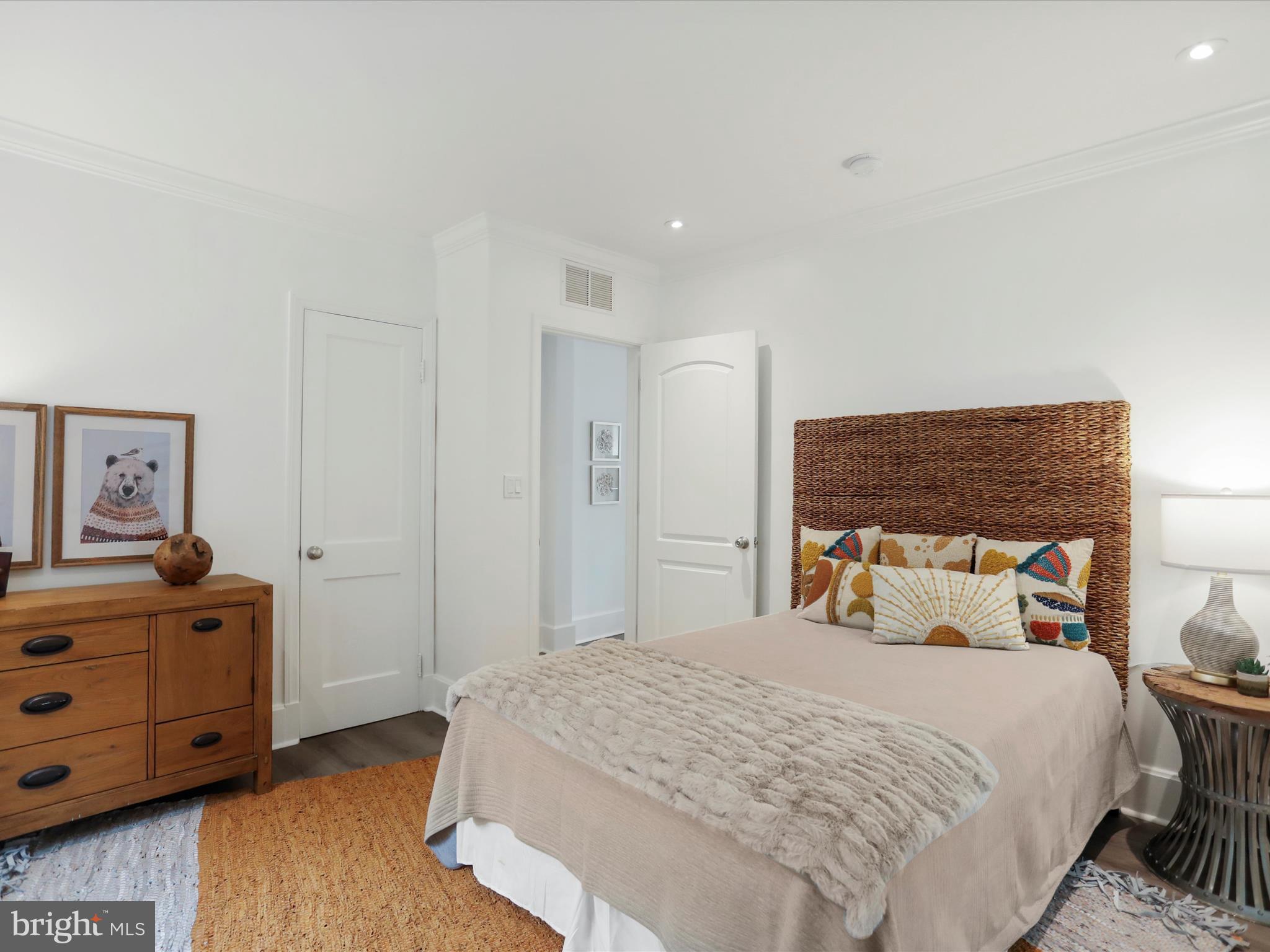 102 Frederick Avenue Frederick, MD 21701 - Photo 15 of 55 a bedroom with a bed and a dresser