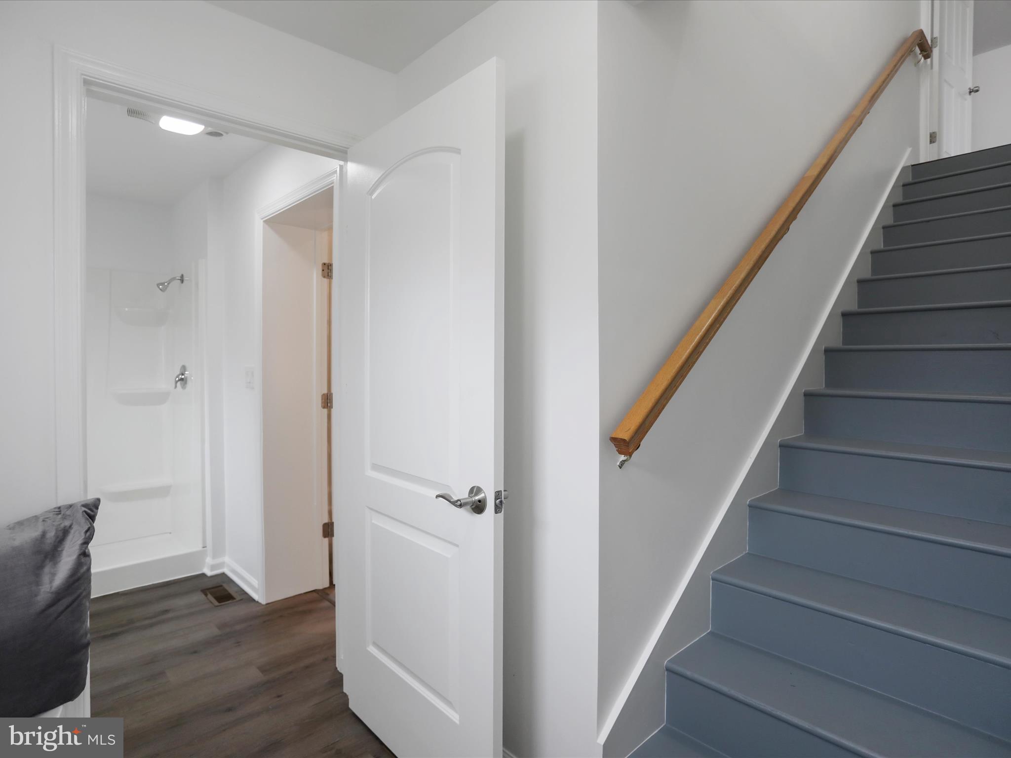 102 Frederick Avenue Frederick, MD 21701 - Photo 20 of 55 a view of entryway with wooden floor and stairs