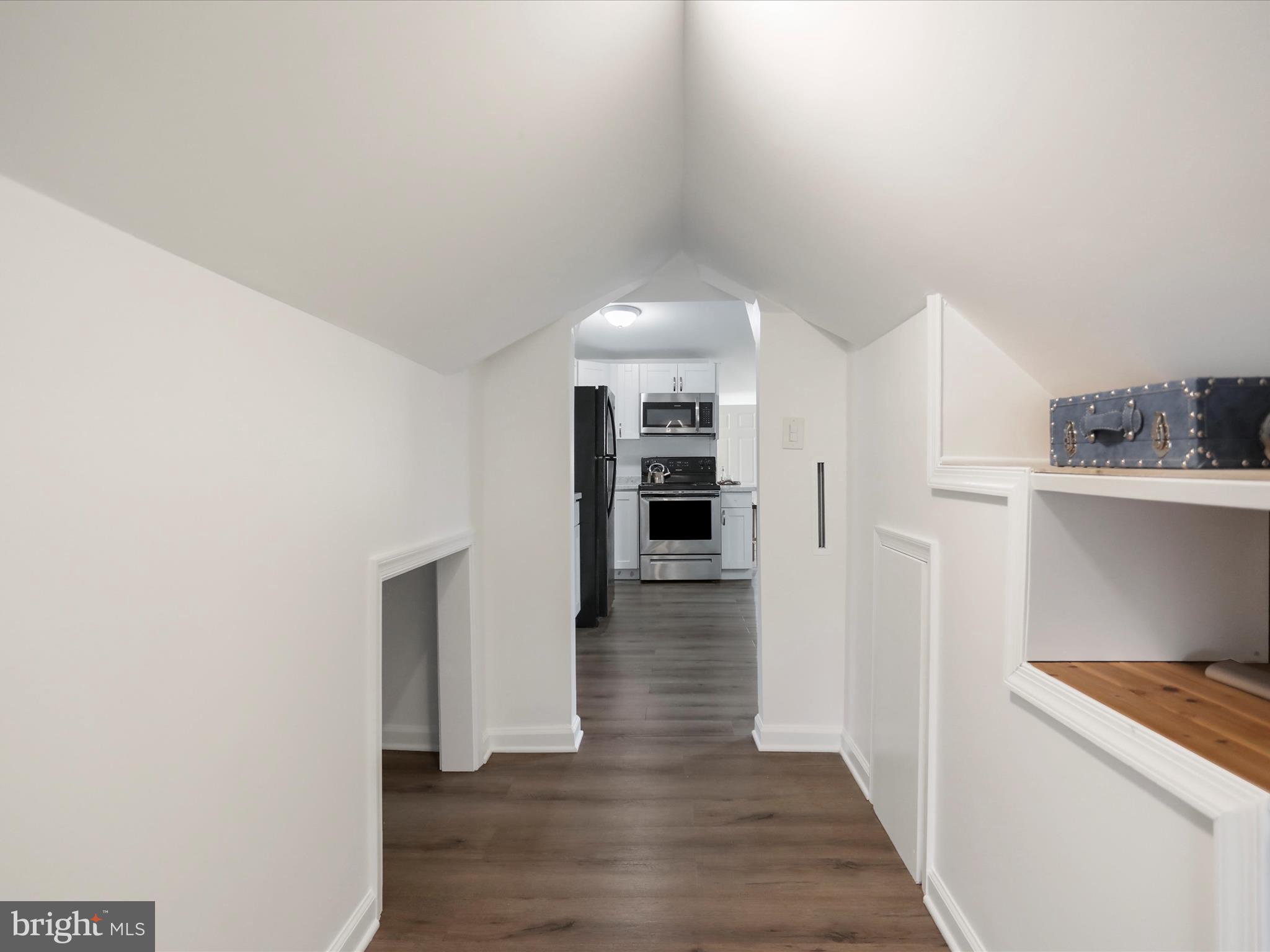 102 Frederick Avenue Frederick, MD 21701 - Photo 28 of 55 a view of a kitchen with wooden floor and a kitchen