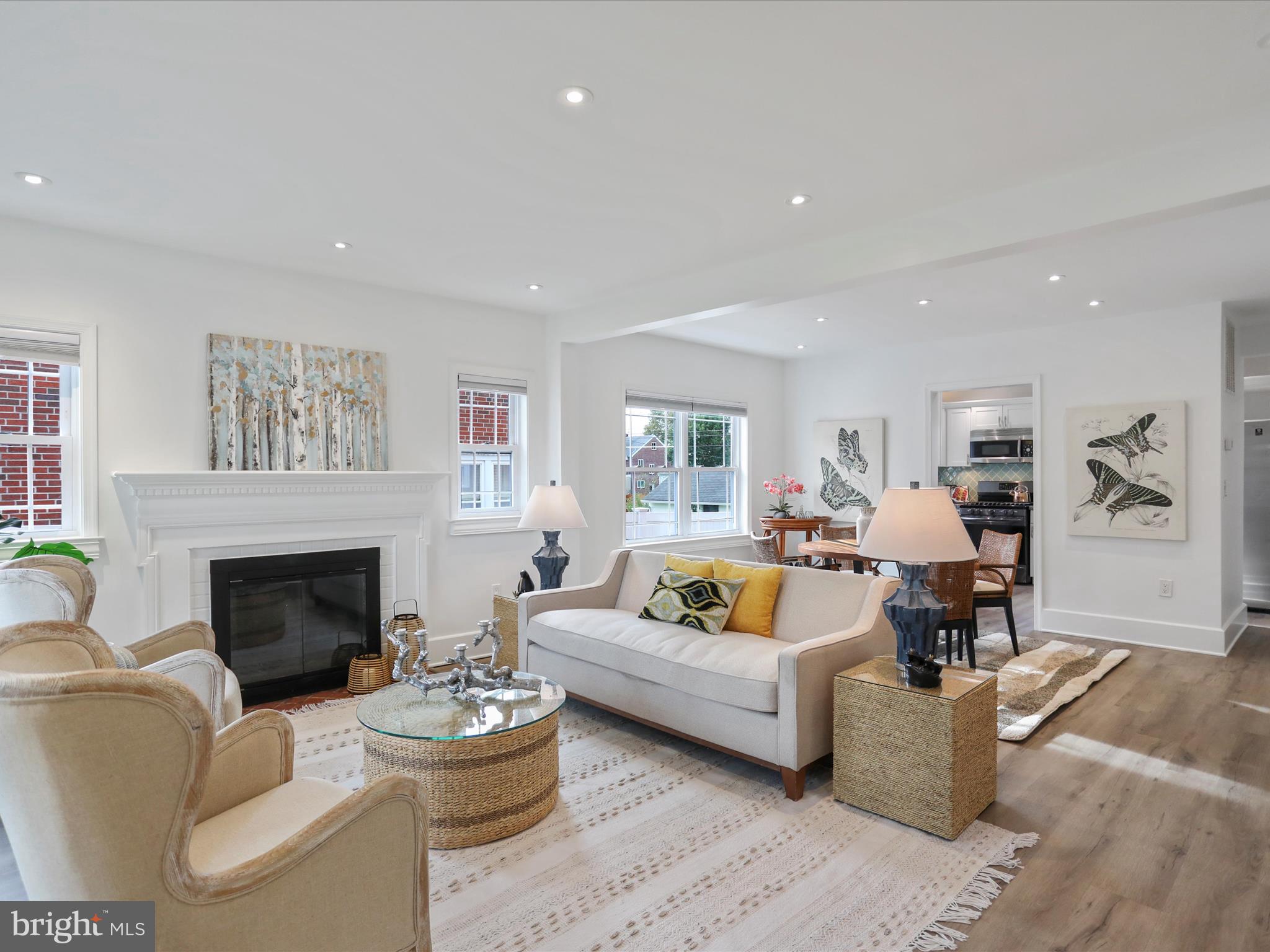 102 Frederick Avenue Frederick, MD 21701 - Photo 4 of 55 a living room with furniture and a fireplace