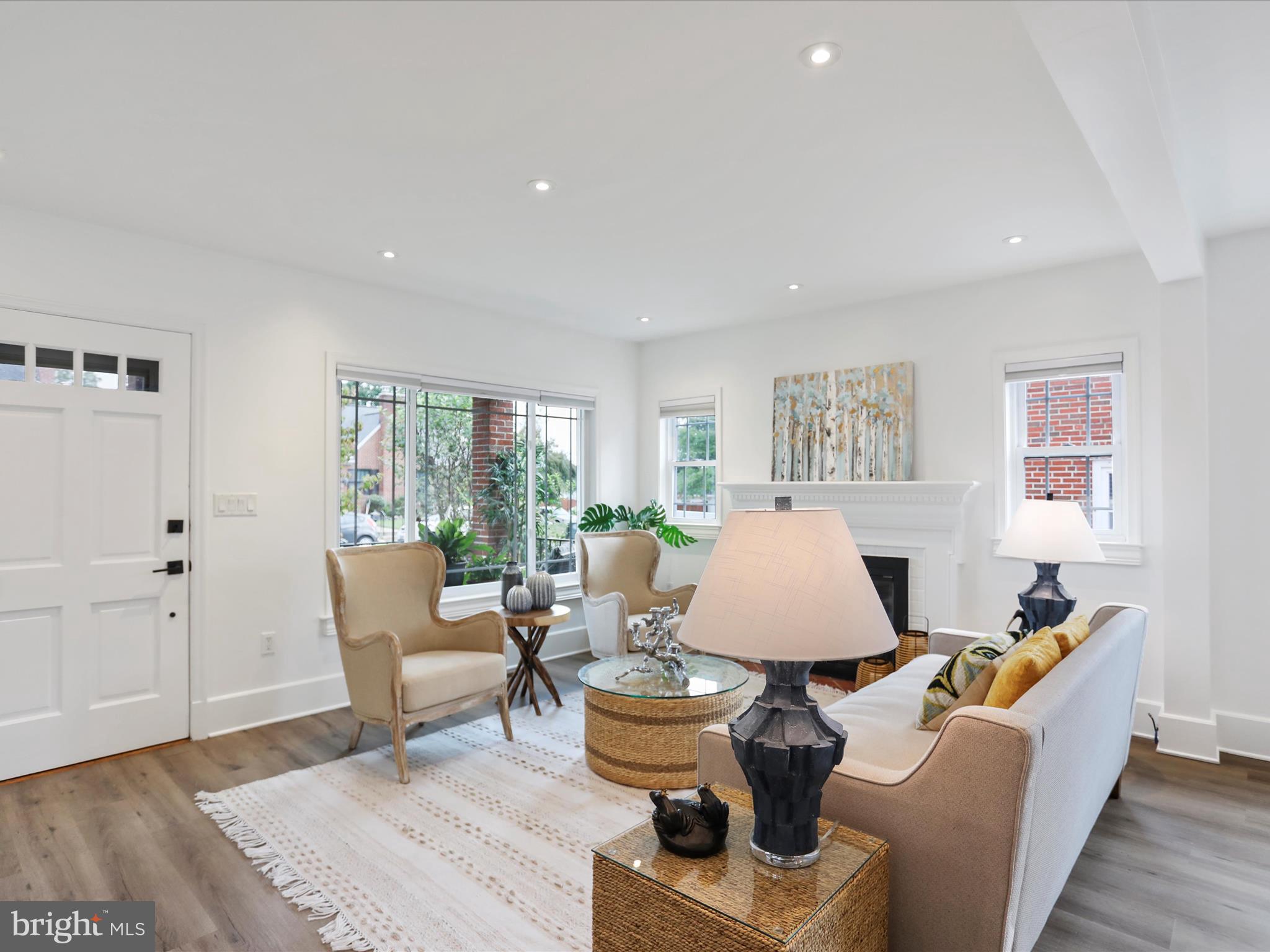 102 Frederick Avenue Frederick, MD 21701 - Photo 5 of 55 a living room with furniture a window and a lamp