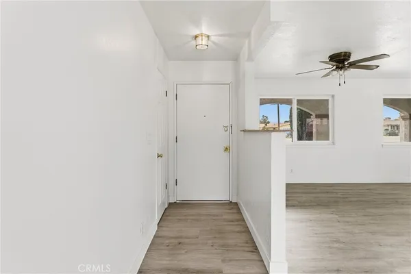 a view of a hallway with closet