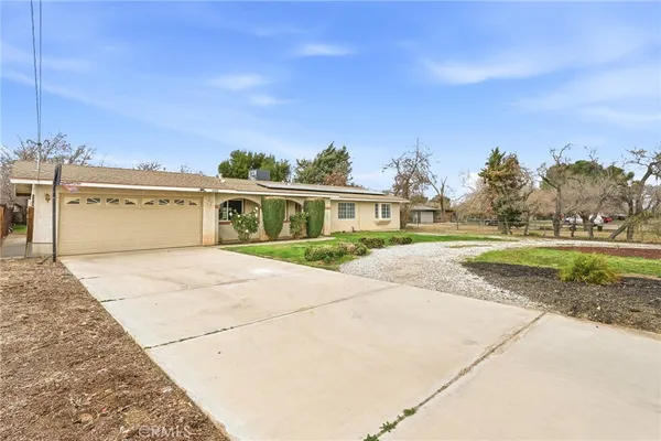 a view of a house with a big yard