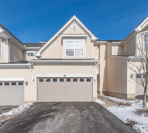 a view of a house with a garage