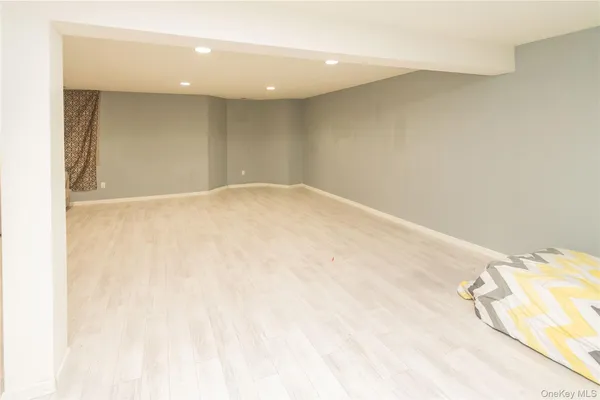 a view of a kitchen with furniture and a window