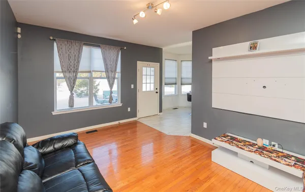 a bed room with a bed and a window