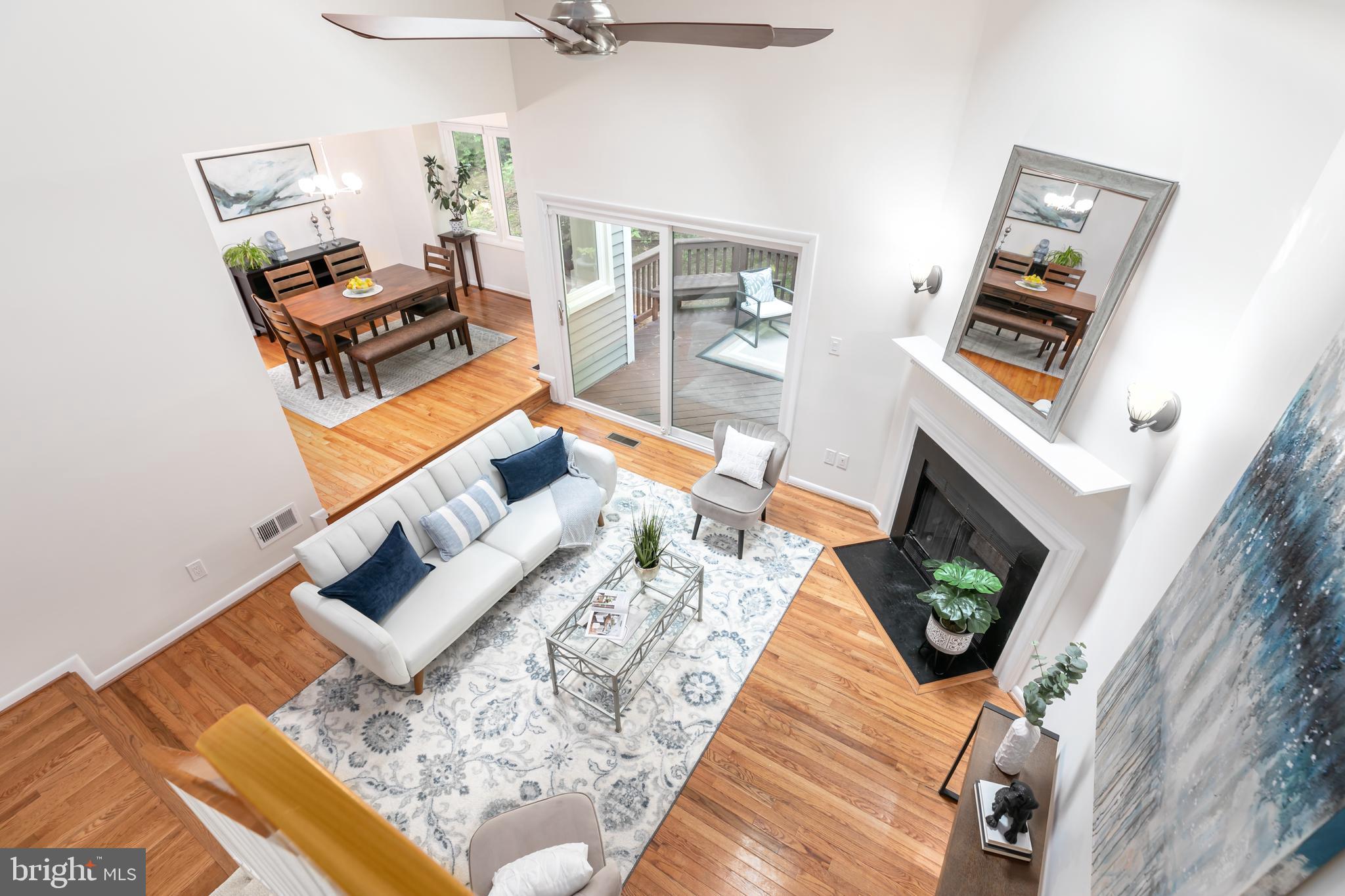 11554 Brass Lantern Court Reston, VA 20194 - Photo 12 of 47 a living room with furniture and a fireplace