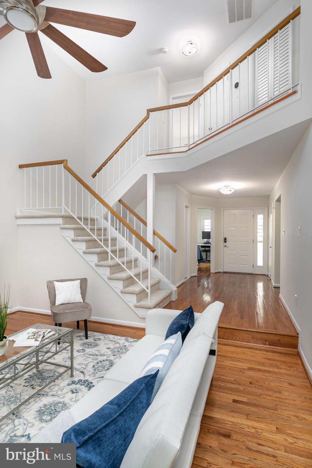 11554 Brass Lantern Court Reston, VA 20194 - Photo 14 of 47 a view of entryway and hall with wooden floor