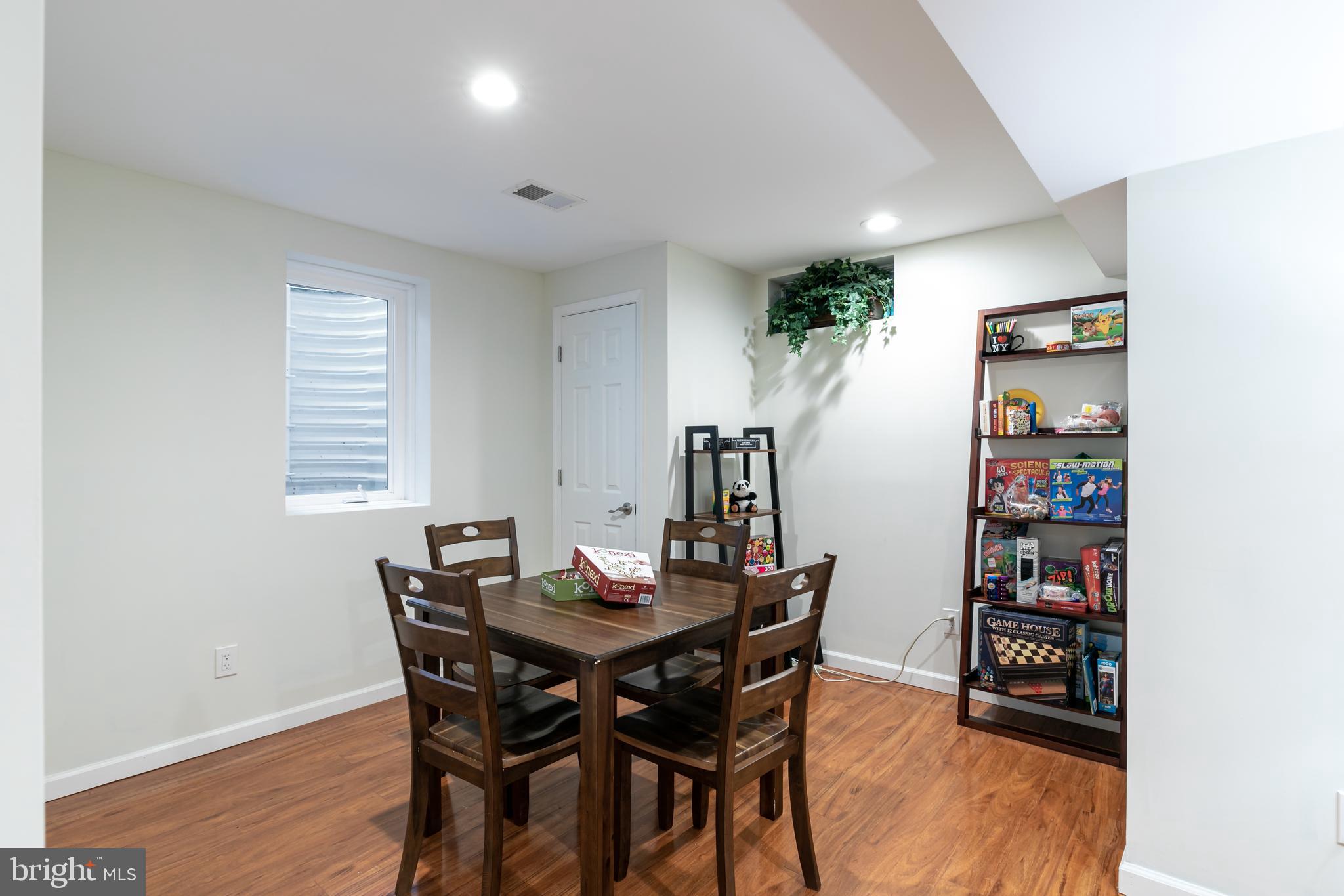 11554 Brass Lantern Court Reston, VA 20194 - Photo 33 of 47 a view of a dining room with furniture and window