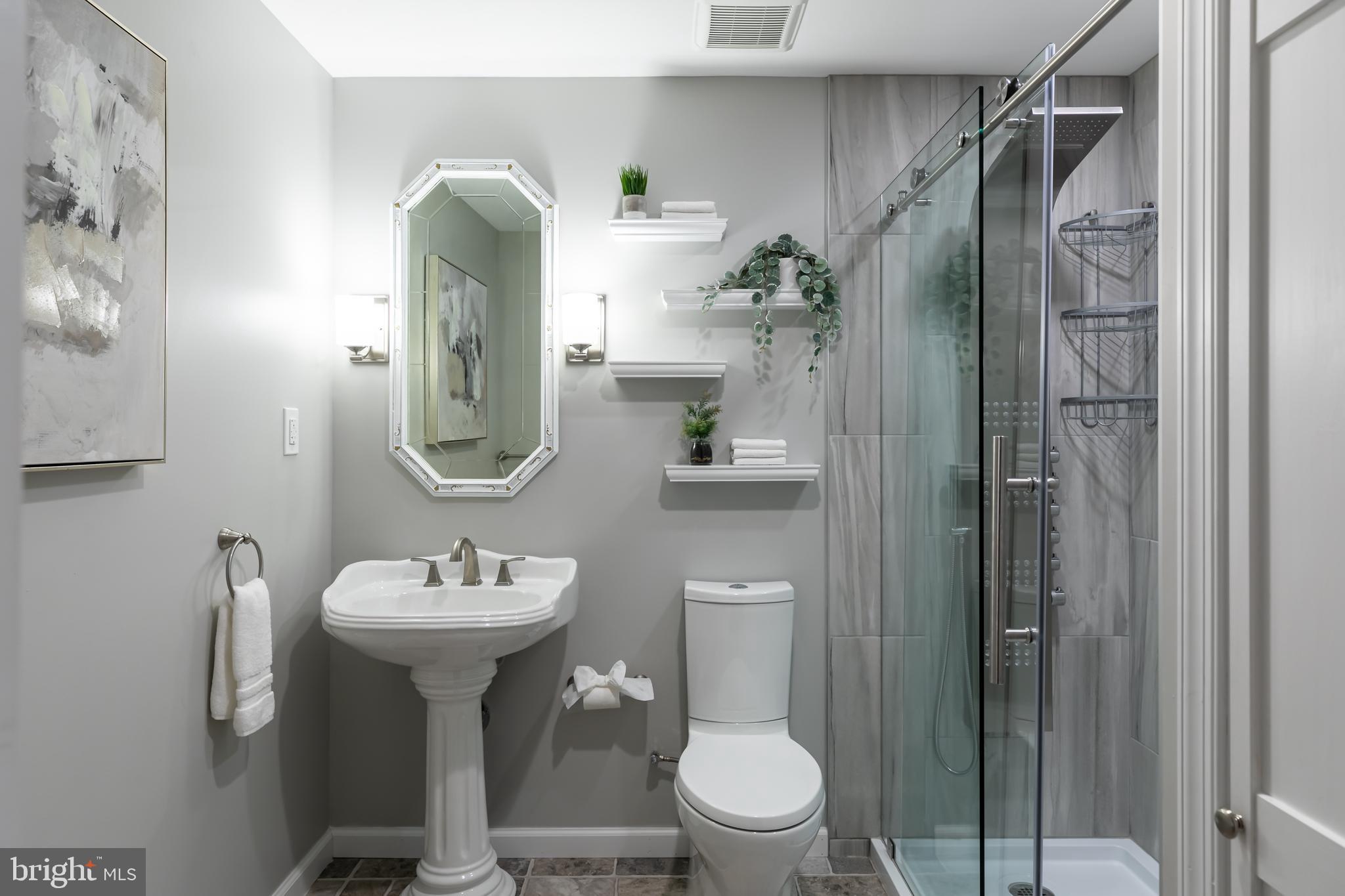 11554 Brass Lantern Court Reston, VA 20194 - Photo 35 of 47 a bathroom with a sink toilet and shower