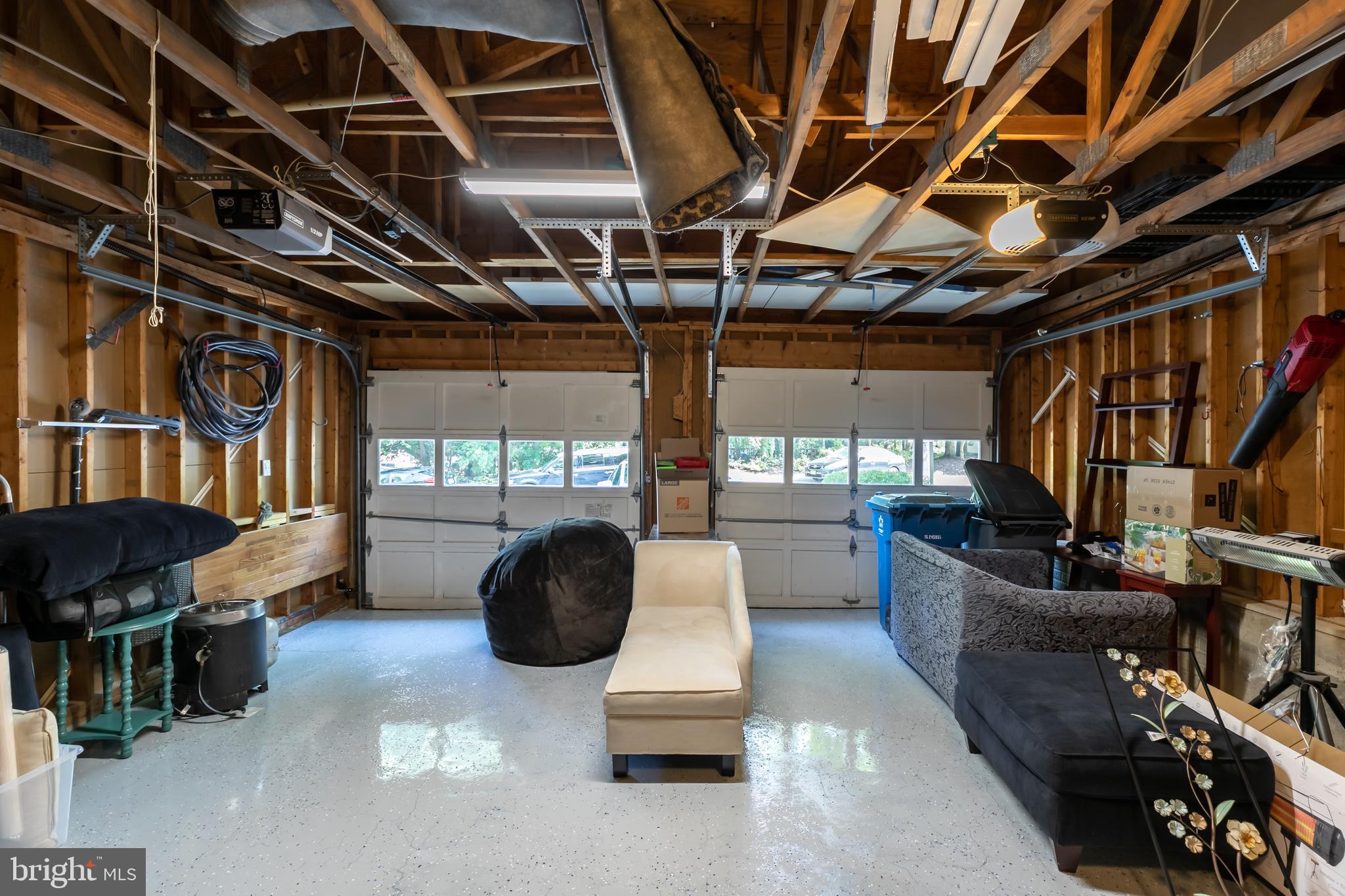 11554 Brass Lantern Court Reston, VA 20194 - Photo 40 of 47 a living room with furniture and a flat screen tv
