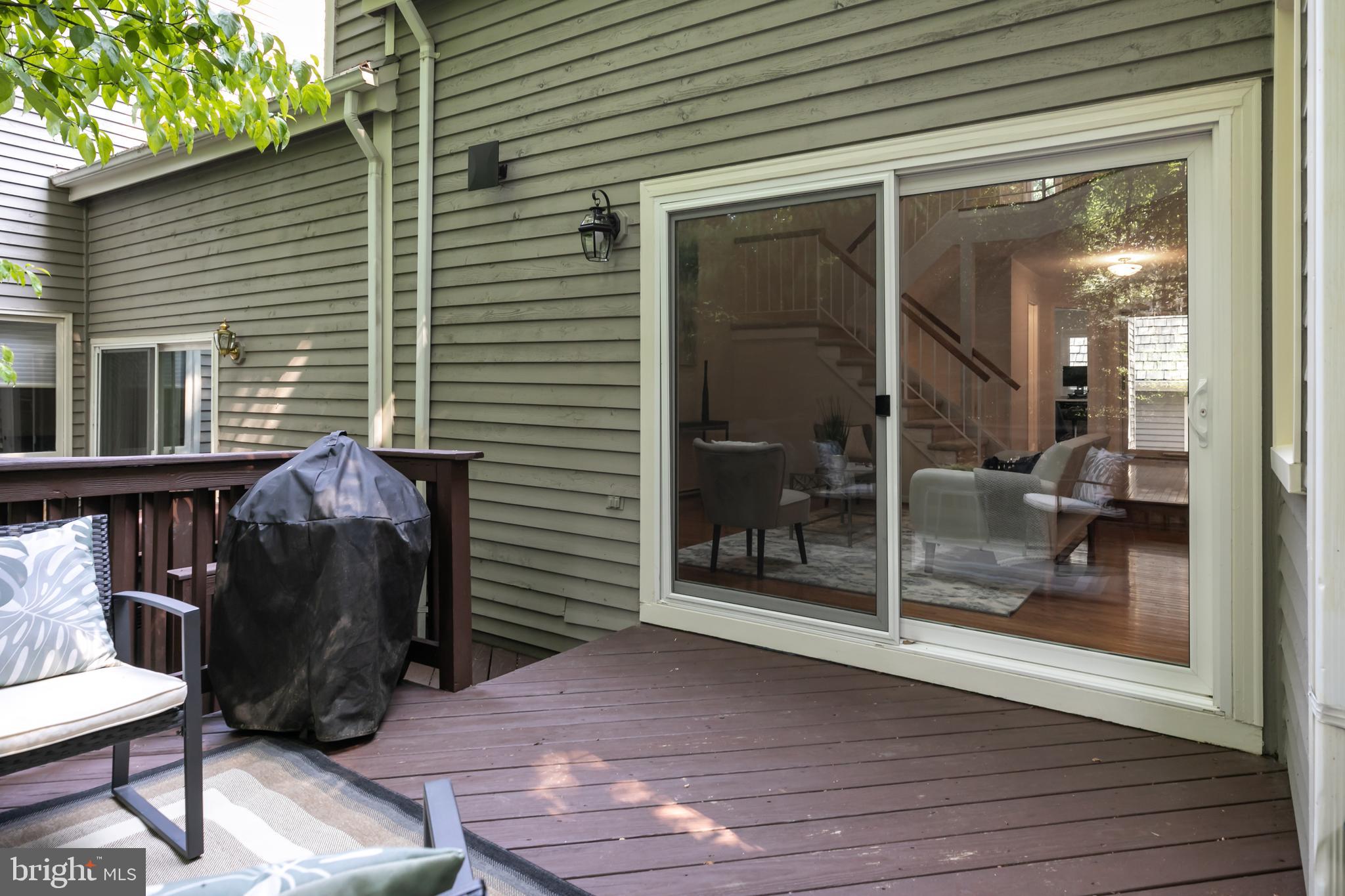 11554 Brass Lantern Court Reston, VA 20194 - Photo 42 of 47 a view of livingroom with furniture and floor to ceiling window