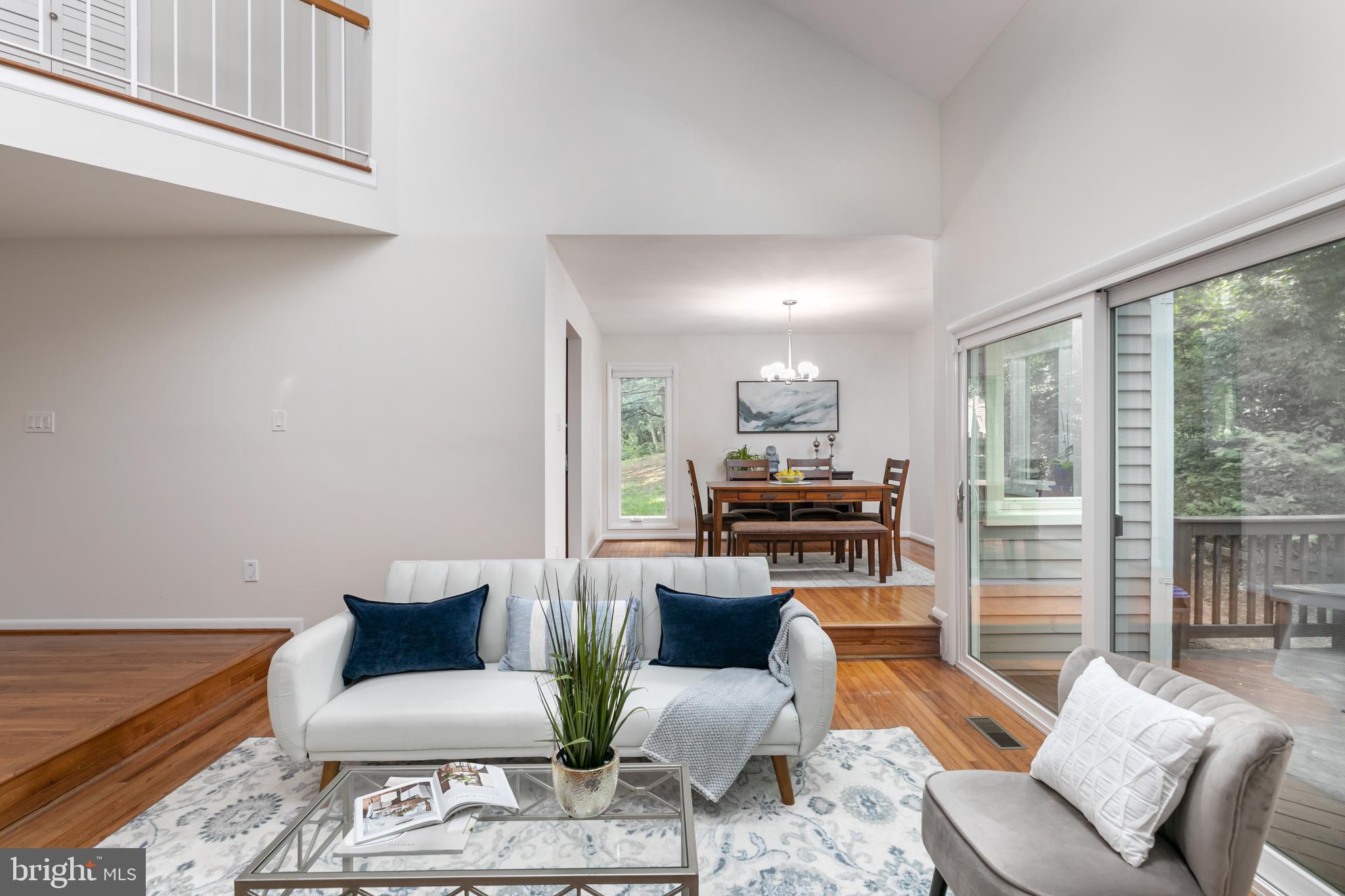 11554 Brass Lantern Court Reston, VA 20194 - Photo 7 of 47 a living room with furniture and a window