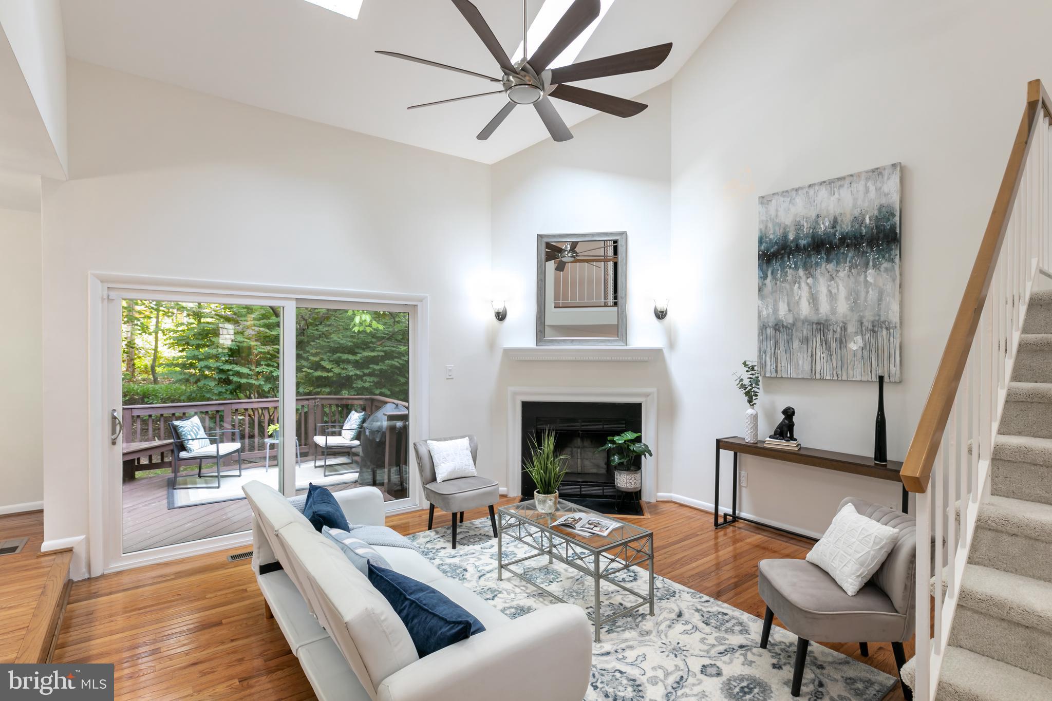 11554 Brass Lantern Court Reston, VA 20194 - Photo 8 of 47 a living room with furniture and a fireplace