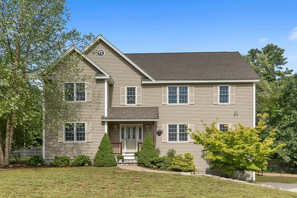 318 Great Road Shirley, MA 01464 - Photo 2 of 36 a house view with a garden space
