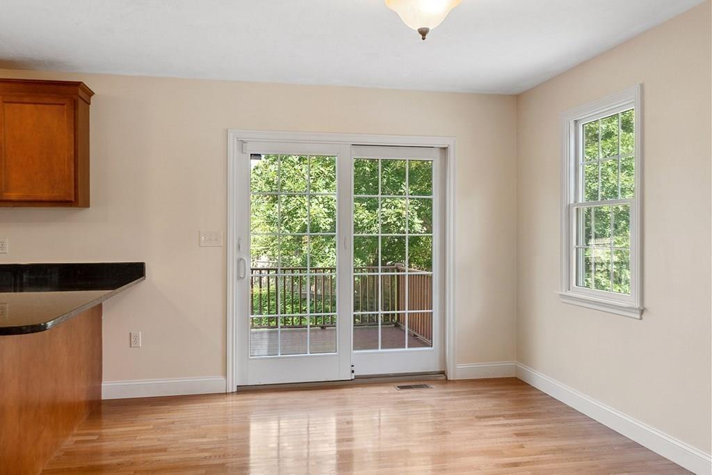 318 Great Road Shirley, MA 01464 - Photo 28 of 36 a view of empty room with wooden floor and fan