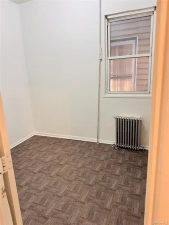 a white refrigerator freezer and a stove sitting inside of a kitchen