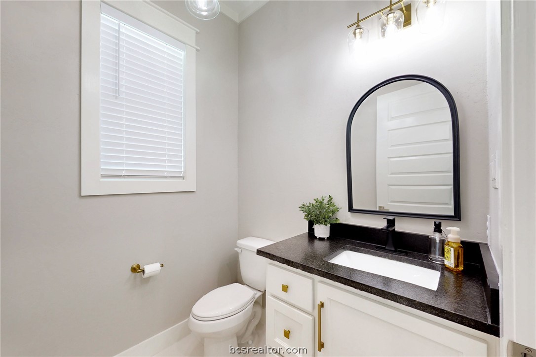 13504 Hudson Farms Road Hearne, TX 77859 - Photo 14 of 48 This is the half bath close to the back door entrance.