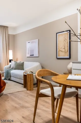 a bedroom with a bed and a desk