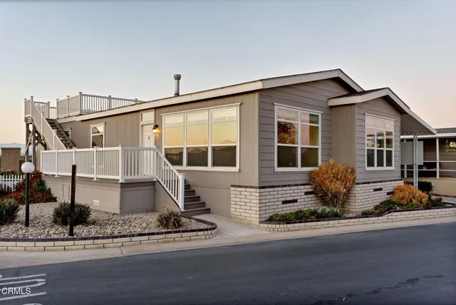 a front view of a house with entertaining space
