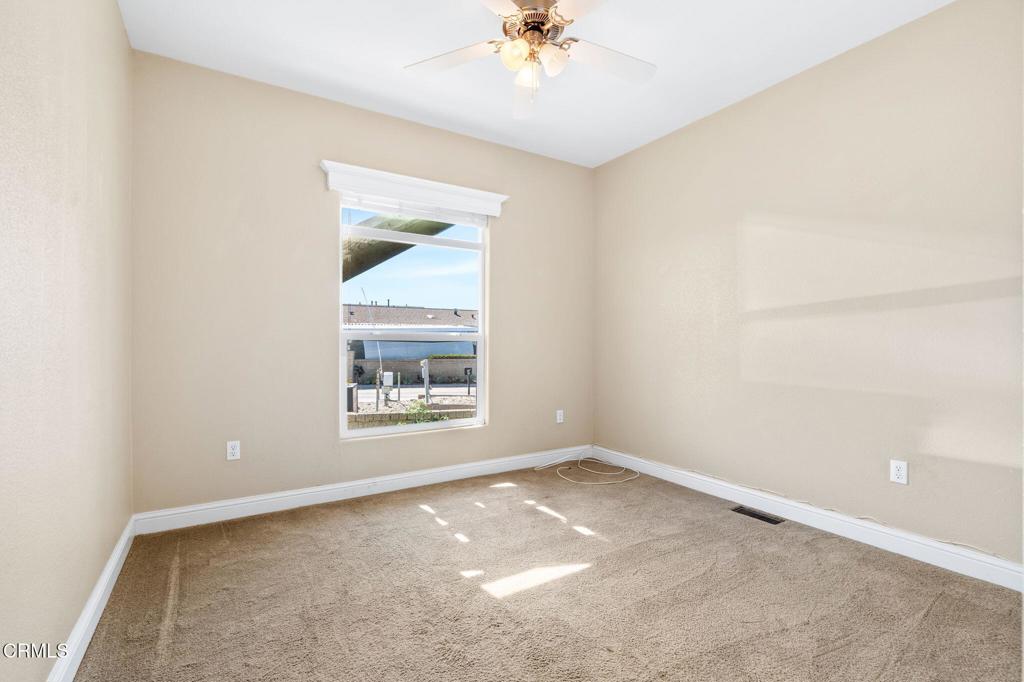 5540 West 5th Street, Unit 1 Oxnard, CA 93035 - Photo 15 of 35 an empty room with a window