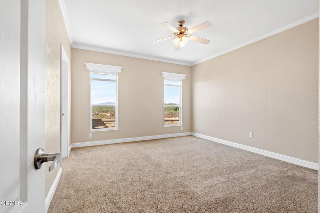5540 West 5th Street, Unit 1 Oxnard, CA 93035 - Photo 17 of 35 an empty room with windows