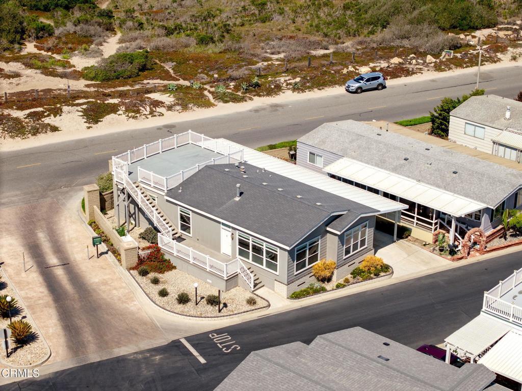 5540 West 5th Street, Unit 1 Oxnard, CA 93035 - Photo 26 of 35 an aerial view of a house with a ocean view