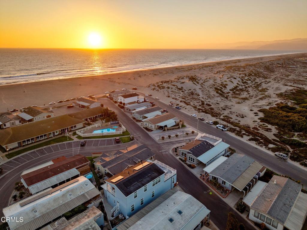 5540 West 5th Street, Unit 1 Oxnard, CA 93035 - Photo 3 of 35 an aerial view of residential building with ocean